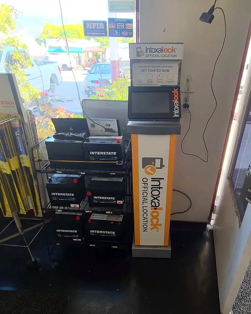 The Intoxalock official location kiosk beside the Interstate battery rack in the front office