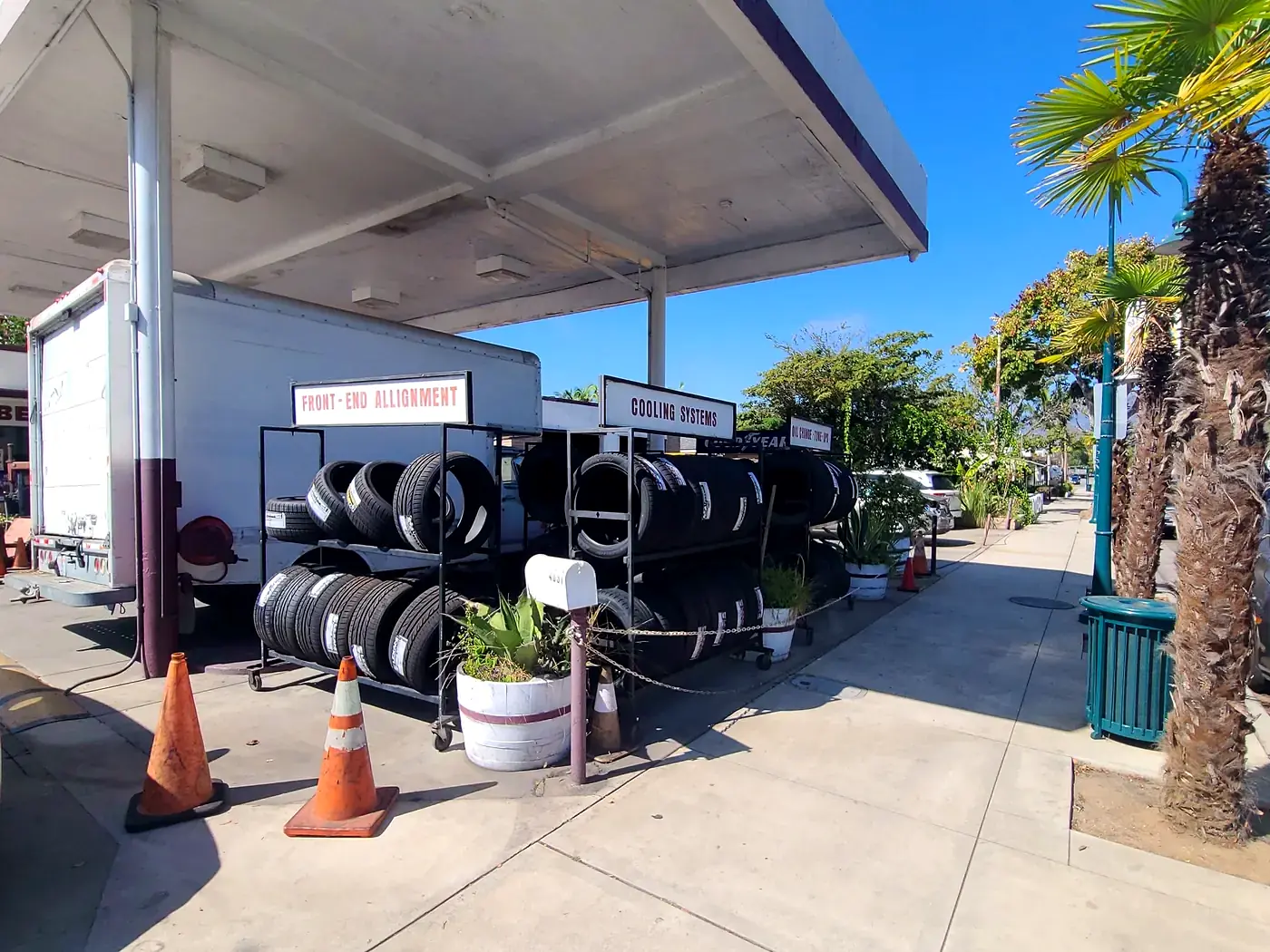 Racks of tires under the canopy at Beach Motor & Tires, Carpinteria Ave