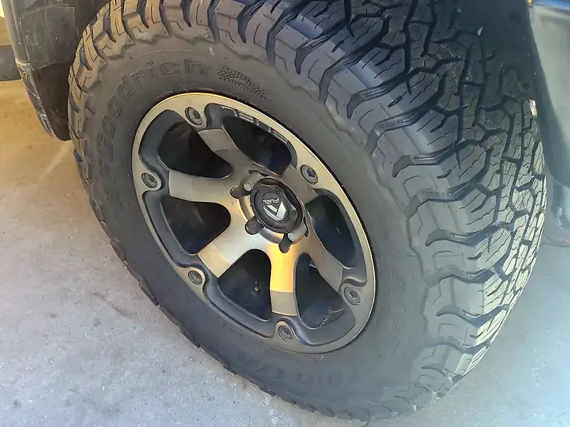 A new BFGoodrich all-terrain tire on a black Fuel wheel, freshly mounted on a customer’s Toyota Tundra